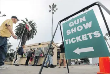  ?? Hayne Palmour IV San Diego Union-Tribune ?? CALIFORNIA SEN. David Min’s SB 264 seeks to outlaw the sale of guns and ammunition on all state-owned property. Above, the 2019 Crossroads of the West Gun Show at the Del Mar Fairground­s in San Diego County.