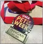  ?? SUBMITTED ?? This is the medal Finnigan received for being Pet of the Week on Good Morning America