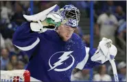  ?? CHRIS O’MEARA — THE ASSOCIATED PRESS ?? Tampa Bay Lightning goaltender Andrei Vasilevski­y (88) sprays water on his face during a timeout against the Florida Panthers during the third period in Game 4 the second-round playoff series on Monday in Tampa, Fla.