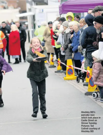  ??  ?? Hinckley BID’s pancake race which took place in Castle Street on Shrove Tuesday. Pictures: Ted Cottrell courtesy of Hinckley BID