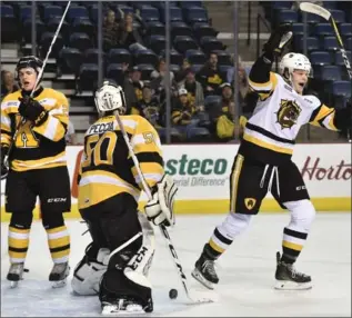  ?? JOHN RENNISON, THE HAMILTON SPECTATOR ?? Hamilton Bulldog Matthew Strome celebrates his first-period goal on Mario Peccia in the Kingston net on Saturday.