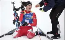  ?? SVEN HOPPE, THE ASSOCIATED PRESS ?? Canada’s Rosanna Crawford celebrates after her third-place finish at the women’s 15 km individual biathlon race in Ruhpolding, Germany.