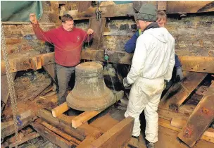  ??  ?? ●●The bells at Christ Church, Healey, being lowered for repairs in April