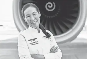  ?? ?? Chef Robynne Maii is owner of Fête Hawaii and one of the chefs tapped by Hawaiian Airlines to help create their in- flight menus. PROVIDED BY RAE HUO