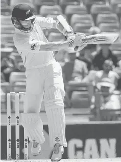  ??  ?? New Zealand’s batsman Kane Williamson plays a shot during day three of the second Test cricket match between Australia and New Zealand in Perth. — AFP photo