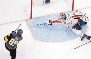  ?? JOHN LOCHER/ASSOCIATED PRESS ?? Braden Holtby, right, is the talk of the league after making this late save against Vegas’ Alex Tuch late in Game 2 on Wednesday.