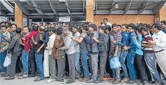  ?? Photo: REUTERS ?? Indians queue up at Nepal’s Tribhuvan Internatio­nal Airport as they wait for an aircraft to evacuate to their country a day after a 7.8 magnitude earthquake in Kathmandu.
