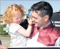  ??  ?? NUMBER ONE FAN: Dean Yendall, with his daughter Mia, wins the 2018 Horsham Cup on Another Coldie to deliver champion trainer Darren Weir his first Horsham Cup, and below, Carly Crouch with her daughter Ruby Crouch and mother-in-law Judy Crouch enjoying the atmosphere. Pictures: PAUL CARRACHER