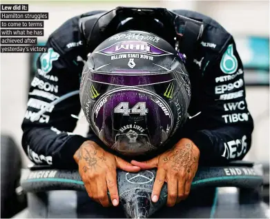  ?? PICTURE: GETTY ?? Lew did it: Hamilton struggles to come to terms with what he has achieved after yesterday’s victory