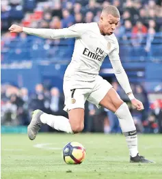  ??  ?? Paris Saint-Germain’s French forward Kylian Mbappe controls the ball during the French L1 football match between Caen (SMC) and Paris Saint-Germain (PSG) at the Michel d’Ornano Stadium in Caen, northweste­rn France, on March 2, 2019. - AFP photo