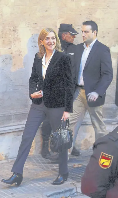  ?? Corbis ?? La infanta Cristina, luego de declarar en los juzgados de Palma de Mallorca, en 2014