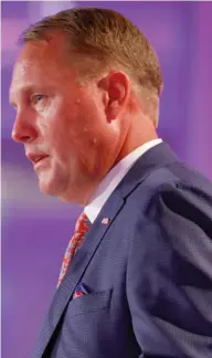  ?? (Photo by Butch Dill, AP) ?? Ole Miss football coach Hugh Freeze speaks during the Southeaste­rn Conference's Football Media Days on Thursday in Hoover, Ala.