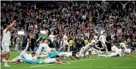  ?? GETTY IMAGES/AP ?? Jack Grealish, left, ponders another agonising Champions League exit for Manchester City, leaving Real Madrid to celebrate a famous win.