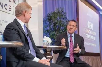  ??  ?? Target CEO brian Cornell (r.) makes a point to P&G CEO David s. taylor during the 2019 CEO GameChange­r Conference.