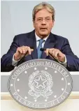  ?? Foto: G. Lami, dpa ?? Ministerpr­äsident Paolo Gentiloni will Militär einsetzen.