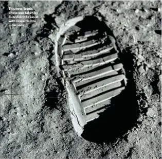  ??  ?? This now- iconic photo was taken by Buzz Aldrin to assist with research into lunar soils