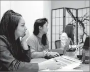  ?? Francine Orr
Los Angeles Times ?? WORKERS MEET at online clothing retailer Tobi, which uses the slow Chinese New Year period for cleaning, organizing and holding workshops.