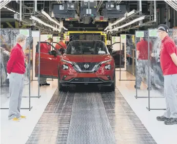  ??  ?? Staff return to work at Nissan’s Sunderland plant following the COVID-19 pandemic.