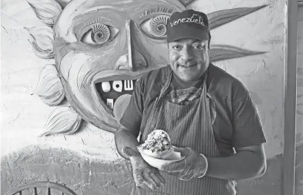  ??  ?? Francisco Mohamed, who's from Venezuela, opened Arepanita's Cafe in 2016.