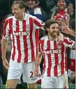  ??  ?? WALKING TALL: Crouch and Allen celebrate Stoke’s goal