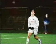  ?? Pete Paguaga / Hearst Connecticu­t Media ?? Greenwich’s Maximo Ferrario celebrates after scoring a penalty kick during the Class LL boys soccer finals between Hall and Greenwich at Trinity Health Stadium on Saturday.