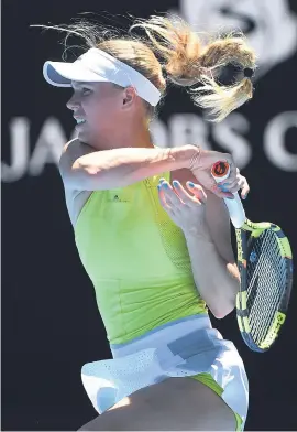  ?? Picture: AFP ?? GRITTY. Denmark’s Caroline Wozniacki was made to dig deep against Croatian Jana Fett during their second round match at the Australian Open in Melbourne yesterday.