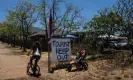  ?? Locals. Photograph: Jae C Hong/AP ?? Tourists have already started trickling back into West Maui in recent weeks, prompting outrage and exhaustion from