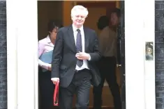  ??  ?? File photo shows David Davis leaving 10 Downing Street in central London after attending the weekly cabinet meeting. — AFP photo