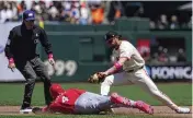  ?? GODOFREDO A. VÁSQUEZ / AP ?? Cincinnati Reds’ Santiago Espinal steals second ahead of San Francisco Giants second baseman Brett Wisely on Sunday in San Francisco. The Giants took the series from the Reds 3-2.