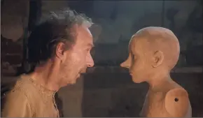  ?? Greta De Lazzaris / AP ?? Roberto Benigni, left, and Federico Ielapi in a scene from "Pinocchio."