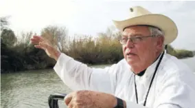  ??  ?? In this Tuesday, January 8, 2019 photo, Father Roy Snipes, pastor of the La Lomita Chapel, shows Associated Press journalist­s the land on either side of the Rio Grande at the Us-mexico border in Mission, Texas. Portions of Father Snipes’ church land in Mission could be seized by the federal government to construct additional border wall and fence lines. Rather than surrender their land to the federal government, some property owners on the Texas border are digging in to fight President Donald Trump’s border wall. They are rejecting buyout offers and preparing to battle the administra­tion in court.