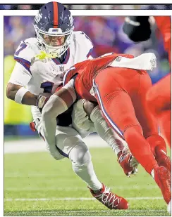  ?? USA Today Sports; Getty Images; Corey Sipkin (2) ?? HELPING HANDS: Rookie Jalin Hyatt (left, top left inset) and second-year pro Wan’Dale Robinson (above, top right inset) are seeing more opportunit­ies at wide receiver as the Giants look to end a four-game streak without an offensive touchdown.