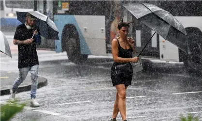  ?? ?? Sydney has received 570mm of rain so far this summer, with floods already affecting parts of NSW and Queensland. Photograph: Bianca de Marchi/AAP