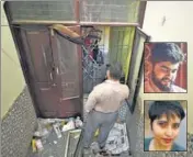  ?? SANCHIT KHANNA/HT ?? A man on Wednesday takes pictures from the window of the flat where Aaftab Poonawala (inset, above) allegedly murdered Shraddha Walkar in Chhattarpu­r in New Delhi.