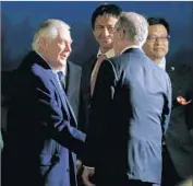  ?? Toru Hanai AFP/Getty Images ?? SECRETARY of State Rex Tillerson, left, in Tokyo. Tillerson allowed one journalist to accompany him on his Asia trip, a reporter from a right-leaning website.