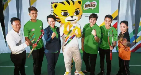  ?? — SAM THAM / The Star ?? Strength in numbers: (from left) Former wushu world champion Ho Ro Bin, national hockey player Joel van Huizen, Milo executive business officer Philomena Tan, KL SEA Games chef de mission Marina Chin, squash player Ng Eain Yow and wushu exponent Diana...