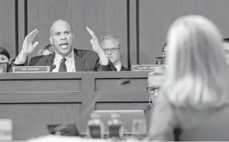  ?? Jose Luis Magana / Associated Press ?? During Tuesday’s hearing before the Senate Judiciary Committee, Sen. Cory Booker, D-N.J., questions Homeland Security Secretary Kirstjen Nielsen about President Donald Trump’s remarks about Africa.