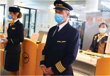  ?? Reuters ?? Beleaguere­d German carrier Lufthansa is in talks with Swiss drugmaker Roche over rapid testing kits that will initially go to cabin crew and ground staff.