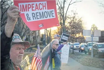  ?? REUTERS ?? Protesters gather near US Senator Mitch McConnell’s home in Louisville.