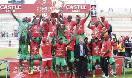  ??  ?? FC Platinum players celebrate after winning the Castle Challenge Cup