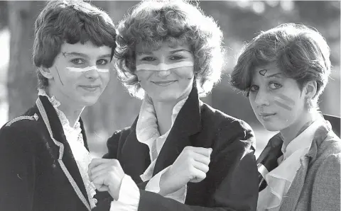  ?? ?? Elizabeth Snell (centre) won a prize as the best Adam Ant lookalike at Newlands in 1981. Elizabeth Robertson (right) was second and Anita Drummond third. Ref:134088-4