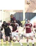  ??  ?? BURNLEY: Burnley’s English defender James Tarkowski (2nd L) vies with Manchester City’s Ivorian midfielder Yaya Toure and Manchester City’s Brazilian midfielder Fernandinh­o (up) during the English Premier League football match between Burnley and...