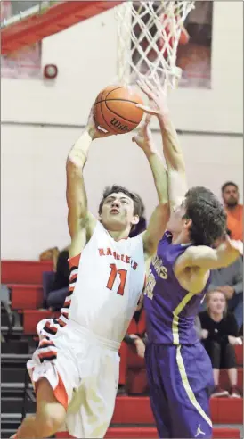  ??  ?? LaFayette’s Stone Graham drives to the hoop in a semifinal game against Sequatchie County last week in Whitwell. The Ramblers went on to beat Ringgold, 54-53, in the tournament finals. (Photo by Scott Herpst) LaFayette 68, South Greene 37 LaFayette 81,...