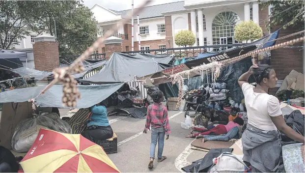  ?? Pictures: Jacques Nelles ?? SEEKING REFUGE. Some of the 620 refugees from various African countries camping outside the UNHCR offices in Pretoria. The growing group of foreign nationals have been camping outside the offices for more than three weeks wanting to be moved out of the country for fear of xenophobic violence.