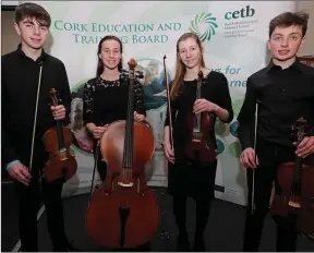  ??  ?? The Crescendo Quartet of Robert Dunne, Aisling Cronin, Kay Thompson and James Dunne from Mallow’s Davis College performed on the awards night.