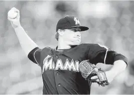  ?? GREG FIUME/ GETTY IMAGES PHOTO ?? Marlins starter Tom Koehler throws a pitch in the first inning against the Nationals on Thursday night. Koehler pitched five innings and gave up six earned runs.