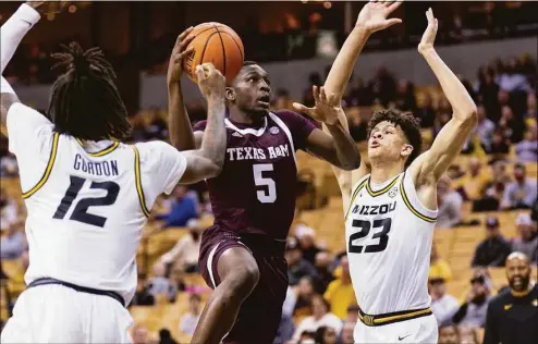  ?? L.G. Patterson / Associated Press ?? Guard Hassan Diarra (5) announced on Wednesday he is transferri­ng from Texas A&M to UConn.