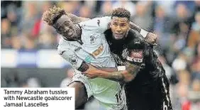  ??  ?? Tammy Abraham tussles with Newcastle goalscorer Jamaal Lascelles