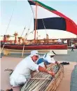  ?? Abdul Rahman/Gulf News ?? Traditiona­l fishing activities such as boat-building and weaving are top draws at the heritage festival.