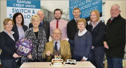  ??  ?? Ned Hartnett who received a presentati­on from staff at Kanturk Credit Union on his 100th birthday, is pictured with his son Michael Hartnett, daughters Rose Murphy and Nora Naughton, and Credit Union staff Claire O’ Riordan, Gillian Taylor, Pat Flynn,...